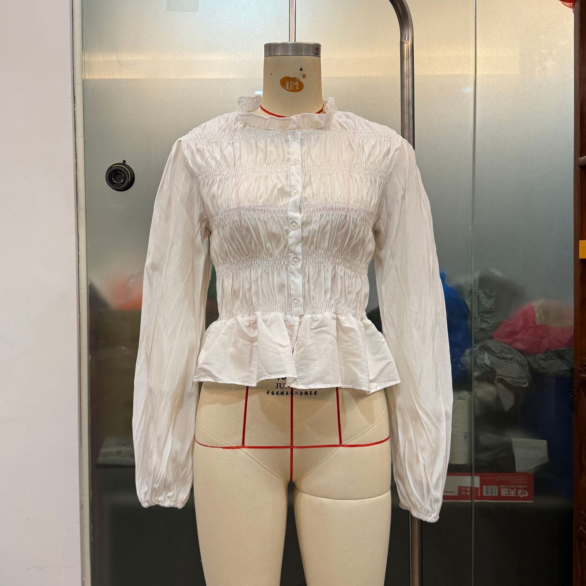 Skyline Ruched Peplum Top